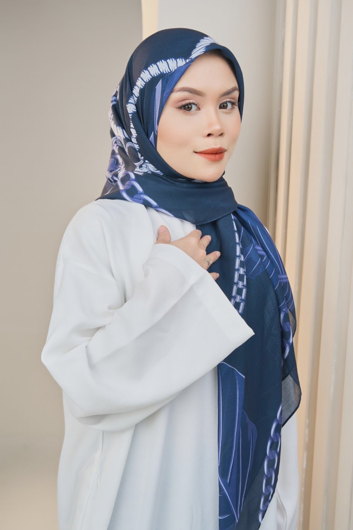 Woman modelling Chain printed tudung bawal from Hana Everyday Collection
